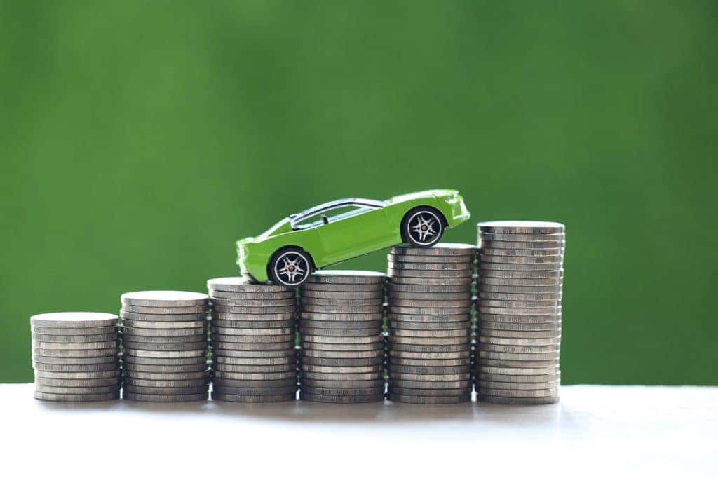 Car on stack of coins