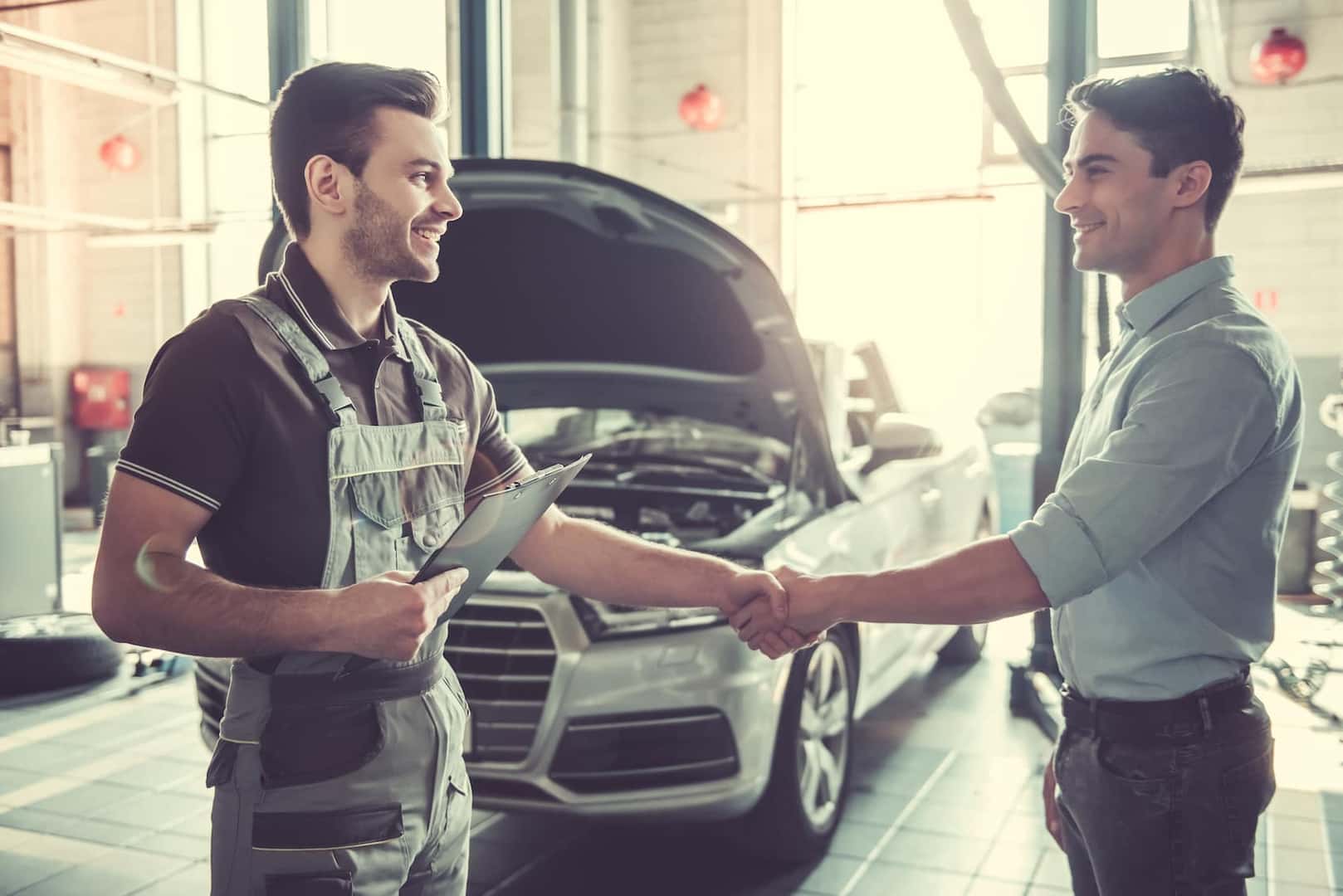 Customer shaking hands with Mazda Service Technician