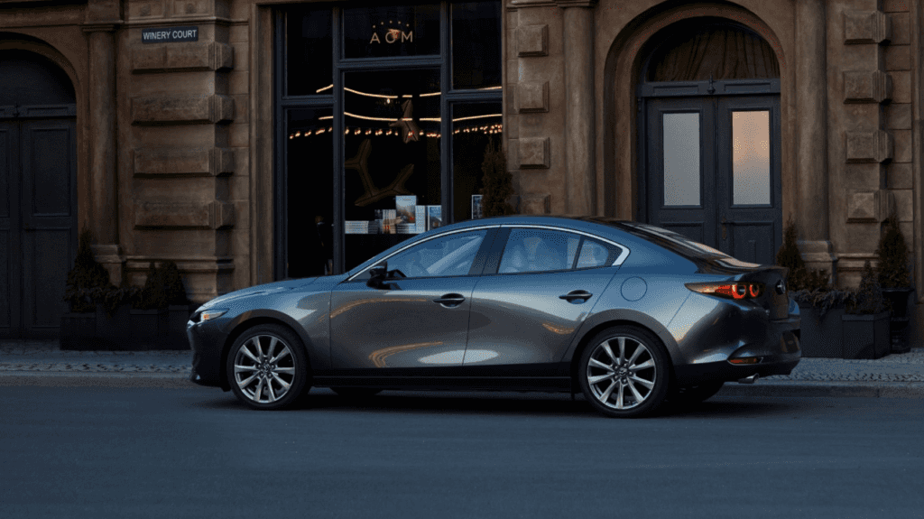 A parked 2026 Mazda3 Sedan in the city