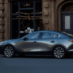 A parked 2026 Mazda3 Sedan in the city