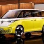 A green 2024 VW ID. Buzz is shown from the front at an angle after leaving a Volkswagen dealership near you.
