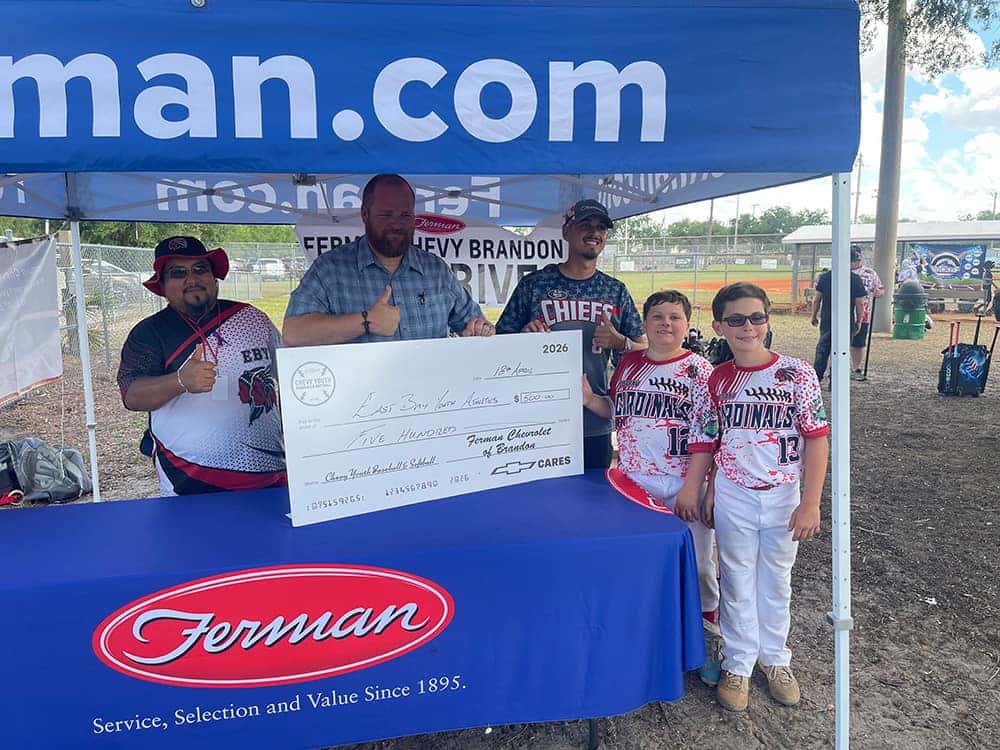 Ferman Tent and Sponsorship Check for East Bay Youth Athletics