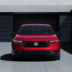 A front facing red Honda Accord