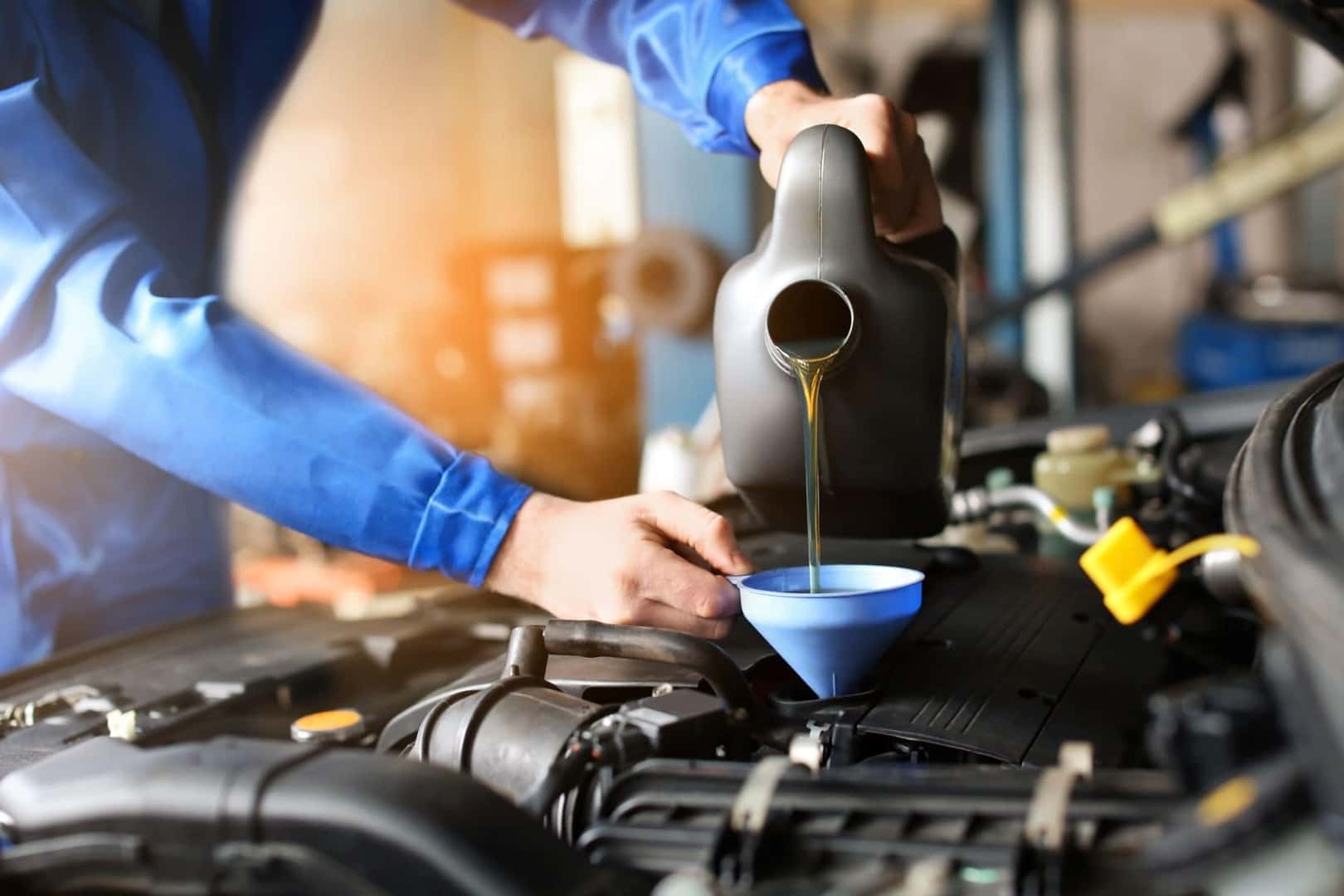 Kia Service Pouring New Engine Oil