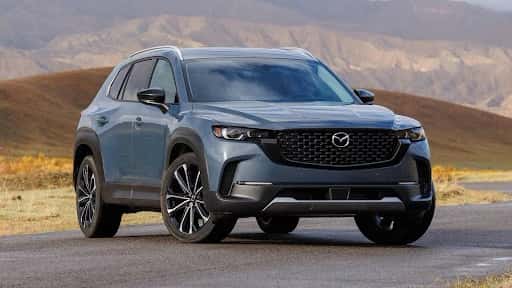Mazda CX-5 SUV on mountain road