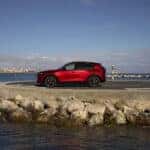 Red Mazda CX-5 by the ocean