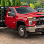 The 2023 Chevrolet Silverado 3500 Chassis Cab parked in a field