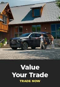 Trade - black vehicle with family getting in