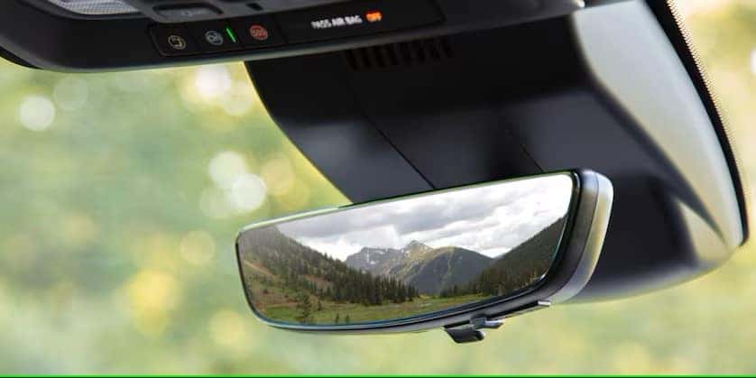2025 chevrolet silverado 1500 rearview mirror showing a valley with mountains