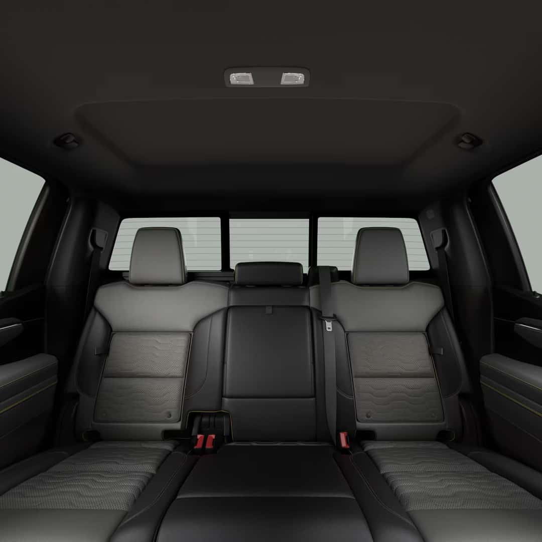 the back seats with gray and black leather interior