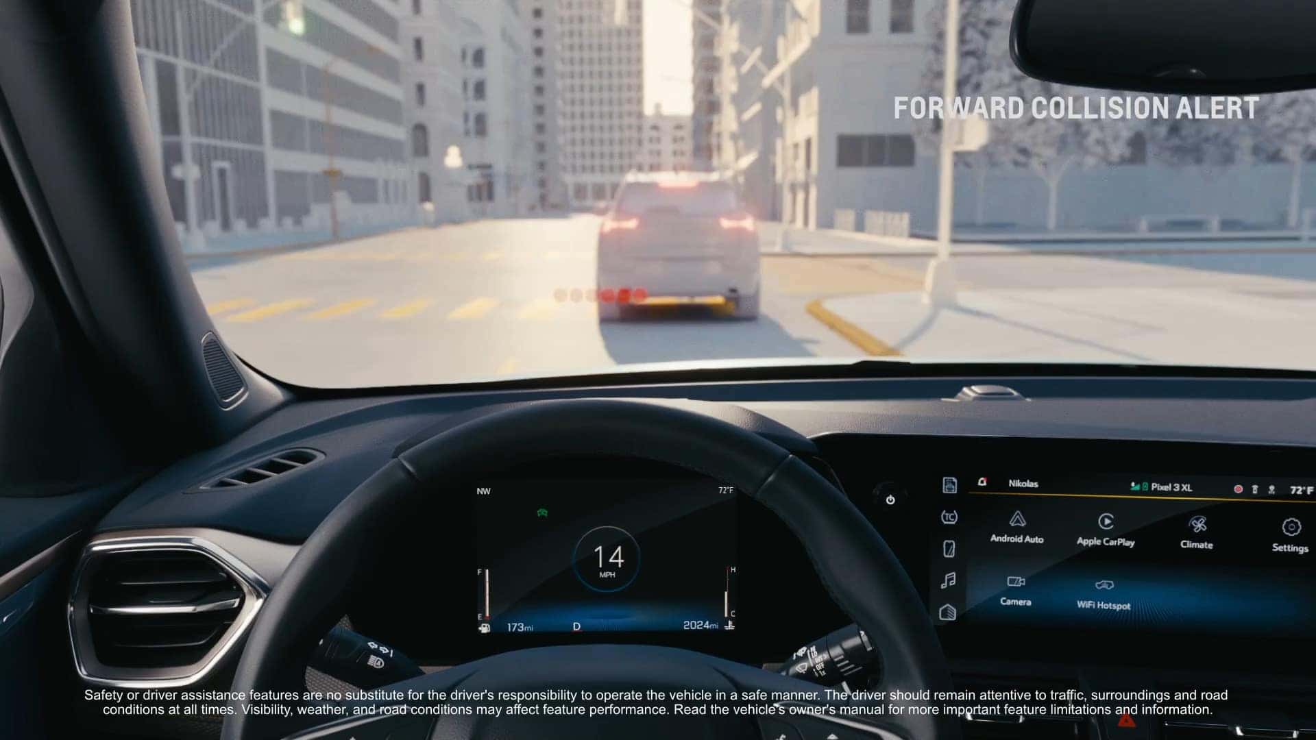 Interior view of the 2025 Chevrolet Trailblazer showcasing the dashboard and digital display with Forward Collision Alert feature activated, providing a safety warning for the driver in an urban environment.