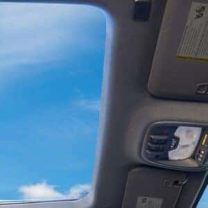 Sunroof view from the 2025 Chevrolet Colorado interior, highlighting open skies and panoramic design.