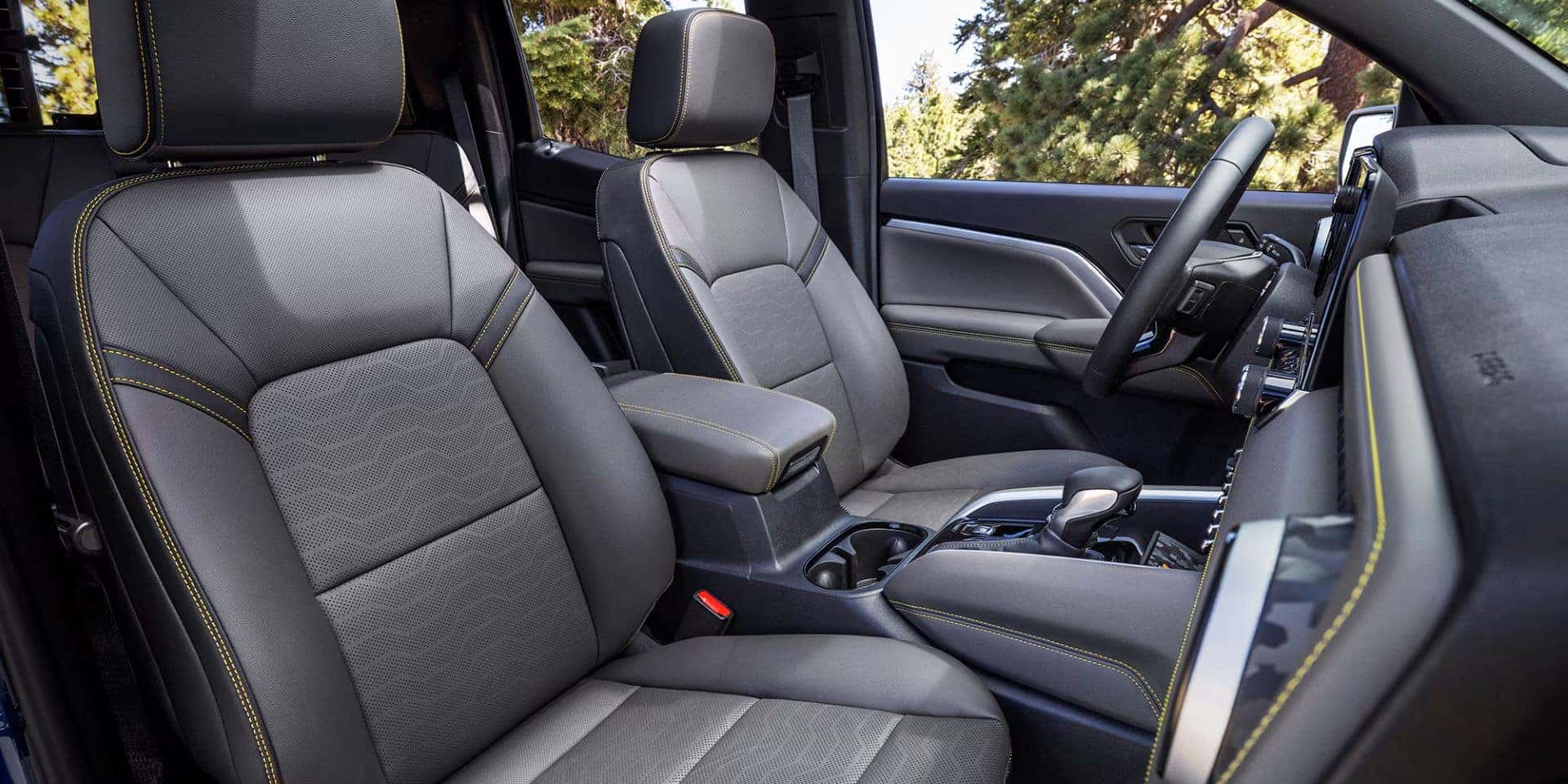 Front seats of the 2025 Chevrolet Colorado featuring premium stitching and ergonomic design.