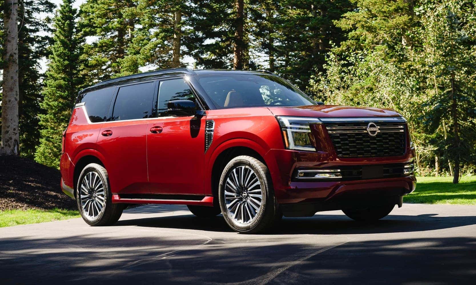 front exterior passenger side view of the all new 2025 Nissan Armada Platinum Reserve luxury SUV