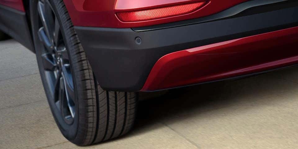 the front passengers tire on a red suv