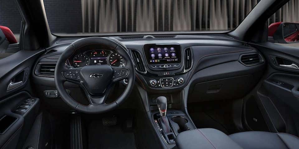 the front drivers view of the interior of an suv