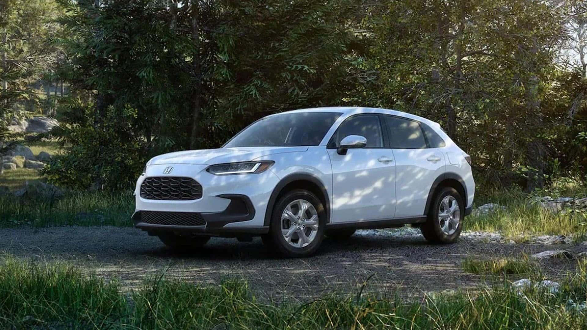 2025 honda hr-v parked surrounded by trees