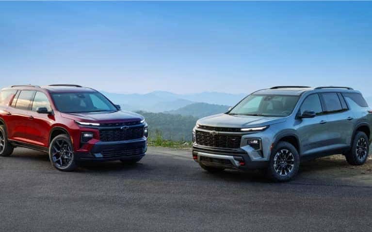 Two Chevrolet SUVs Parked