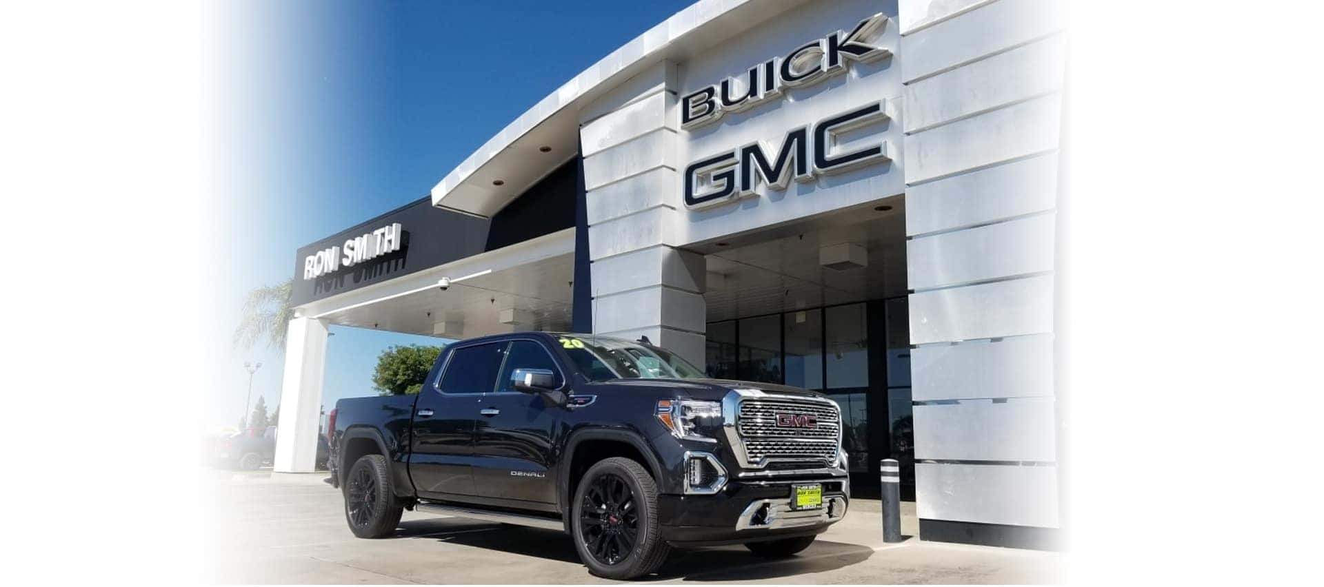 truck parked in front of dealership