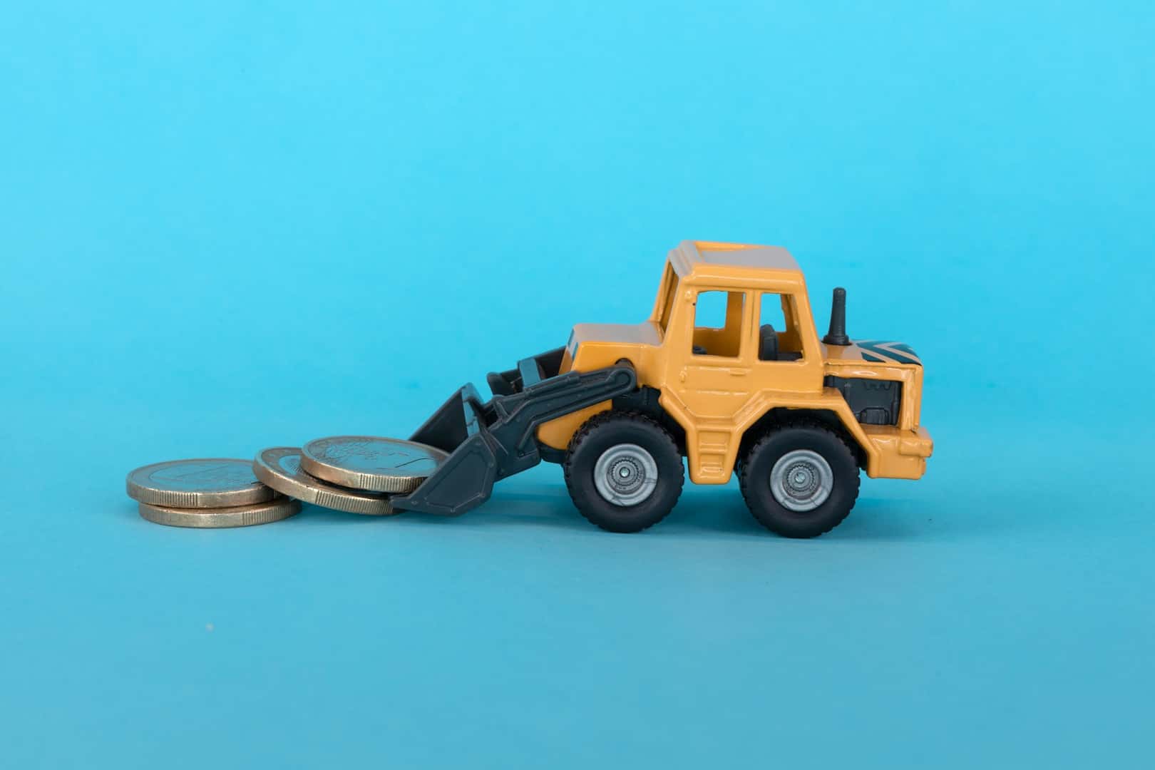 toy bulldozer with coins
