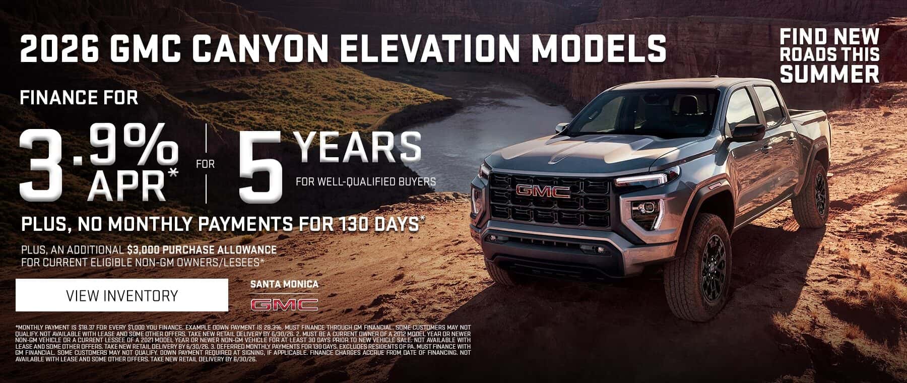 Promotional banner for the 2026 GMC Canyon Elevation models featuring a gray GMC Canyon pickup truck parked in a rugged desert canyon landscape. The advertisement highlights financing offers including 3.9% APR for 5 years for well-qualified buyers, no monthly payments for 130 days, and an additional $3,000 purchase allowance for eligible non-GM owners or lessees. A "View Inventory" call-to-action button appears alongside Santa Monica GMC branding and the slogan, "Find New Roads This Summer."