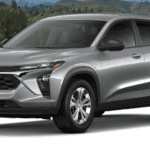 Chevrolet Trax parked in fornt of forest