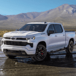 Chevrolet Silverado pickup parked on desert mountain road