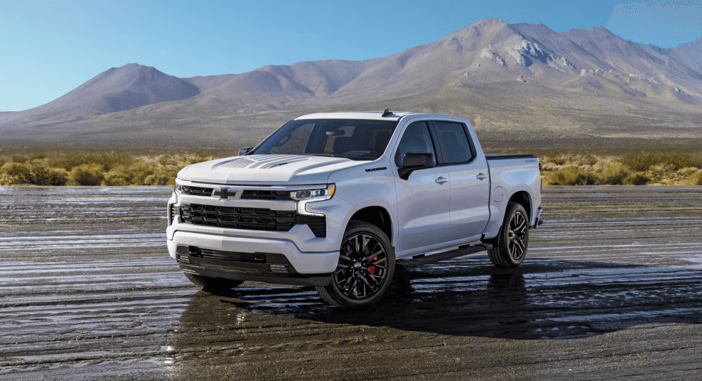 Chevrolet Silverado pickup parked on desert mountain road