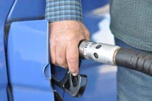 A man fills his car with gas after noticing his check engine light is on in Marion, IL.