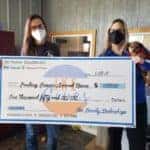 Ike Auto Group presenting a donation to Finding Forever Animal Rescue