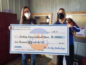 Ike Auto Group presenting a donation to Finding Forever Animal Rescue