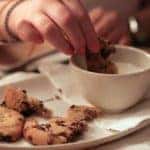Dipping cookies and milk at a bakery in Marion, IL