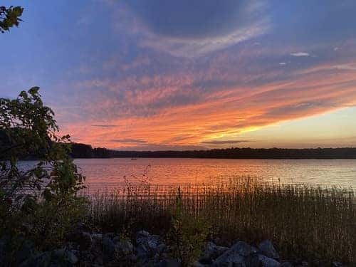 Watching the sunset at Crab Orchard Refuge is a great summer day activity in Marion, Illinois