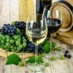 A glass of wine and grapes at a winery in Marion, Illinois