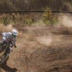 A biker circles a dirt bike track in Marion, Illinois