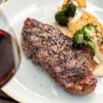 A plate of steak and potatoes at a steakhouse restaurant in Mount Vernon, Illinois