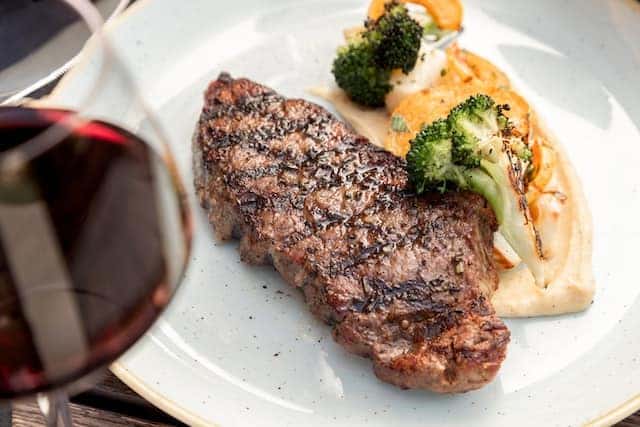 A plate of steak and potatoes at a steakhouse restaurant in Mount Vernon, Illinois
