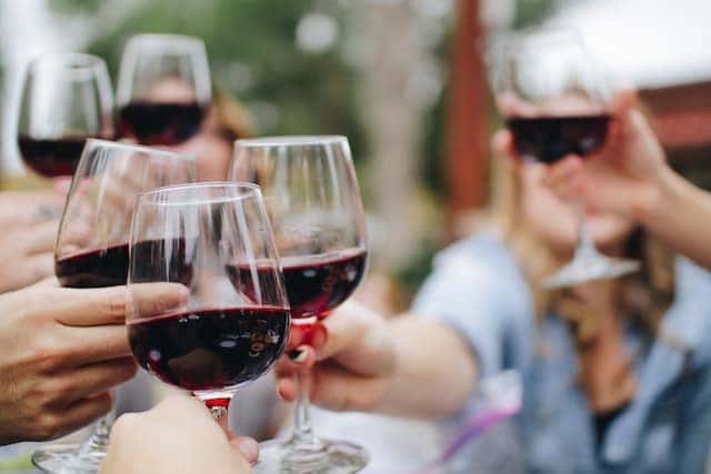 A toast of wine glasses on the Shawnee Hills Wine Trail in Southern Illinois