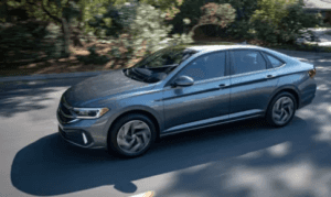 2024 Volkswagen Jetta driving down a southern Illinois road.