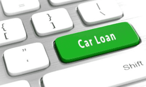 Image of a computer keyboard with car loan as a button key.