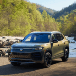 2026 Tiguan in Avocado Green paint color driving offroad.