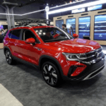 Red Volkswagen vehicle with IQ safe drive technology inside.