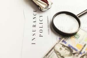 car insurance documents sitting on a table