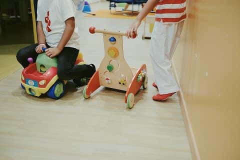 kids playing with toys at a daycare center in Marion, IL