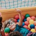 kids playing in a ball pit