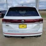 rear view of a white 2026 Volkswagen Atlas parked at the Volkswagen of Marion dealership in Marion, IL