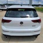 white 2026 VW Golf GTI parked at the Volkswagen of Marion dealership in Marion