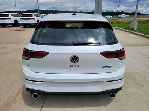 white 2026 VW Golf GTI parked at the Volkswagen of Marion dealership in Marion 