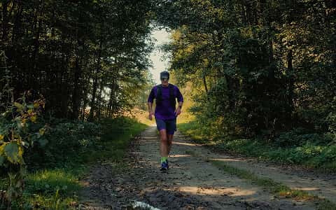 a person walking on a hiking trail