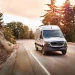 sprinter cargo van driving on open road